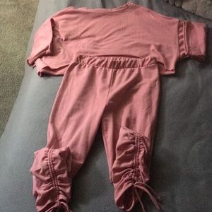 A two piece outfit pink it’s a medium